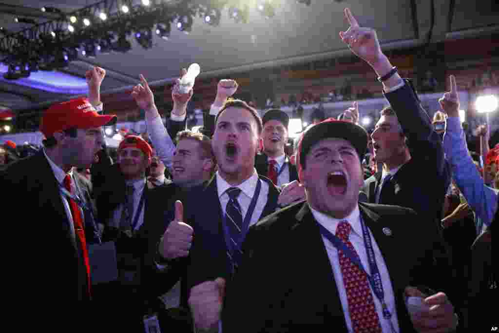 Supporters of President-elect Donald Trump cheer during as they watch election returns during an election night rally, Nov. 9, 2016, in New York. 