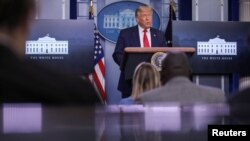 Presiden Donald Trump dalam konferensi pers mengenai pandemi Covid-19 di Gedung Putih, Washington, 28 Juli 2020. 