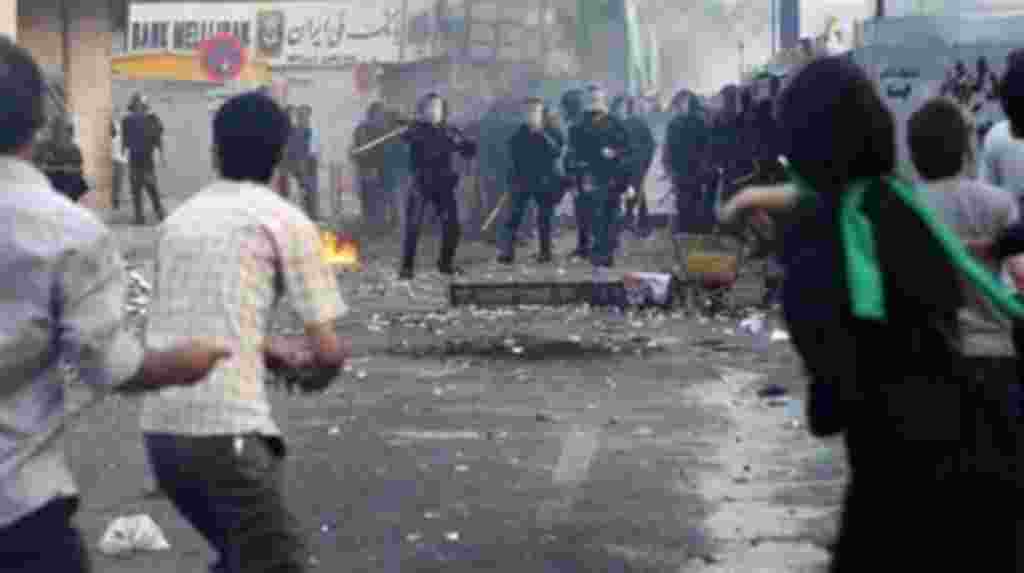 In this photograph posted on the internet, Iranian riot police clash with demonstrators in Tehran, Iran Saturday June 20, 2009. (AP Photo)