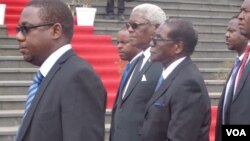 President Robert Mugabe with some state officials at the National Heroes Acre.