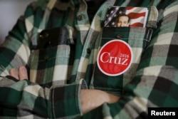 Stephen Hooper listens as U.S. Republican presidential candidate Senator Ted Cruz speaks during a campaign stop at Lino's Restaurant in Sanbornville, New Hampshire, Jan. 19, 2016.