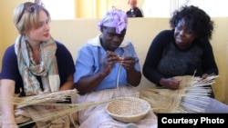 Tourists being taught how to weave some traditional items at Amagugu International Heritage Center. (Photo: Amagugu)