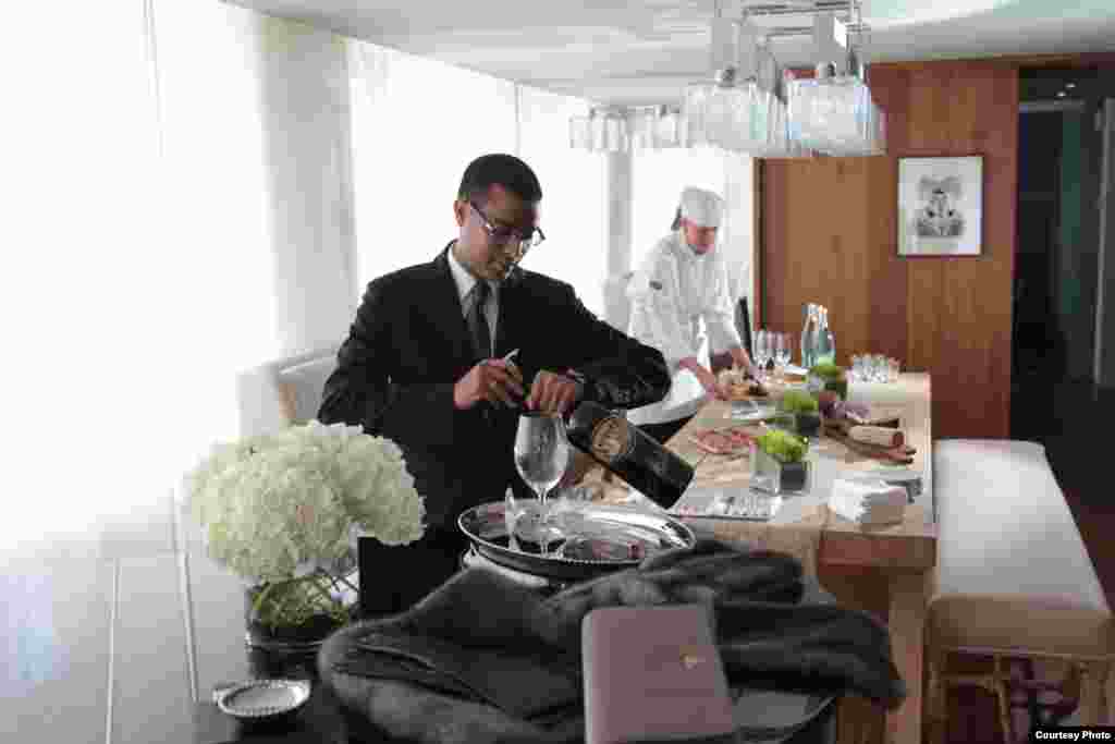 A butler and cheese specialist work at the presidential suite at Washington's Park Hyatt hotel. (Park Hyatt) 