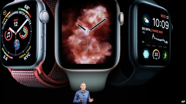 Jeff Williams, Apple's chief operating officer, speaks about the Apple Watch Series 4 at the Steve Jobs Theater during an event to announce new Apple products Wednesday, Sept. 12, 2018, in Cupertino, Calif. (AP Photo/Marcio Jose Sanchez)