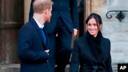 FILE - In this Jan.18, 2018 photo, Britain's Prince Harry and his fiancee Meghan Markle leave after a visit to Cardiff Castle in Cardiff. When Meghan wore jeans from the Hiut Denim Company, there was worldwide publicity about a firm in Wales which started to re-employ workers displaced when the local factory closed, helping small companies like Hiut buck the globalization trend. 