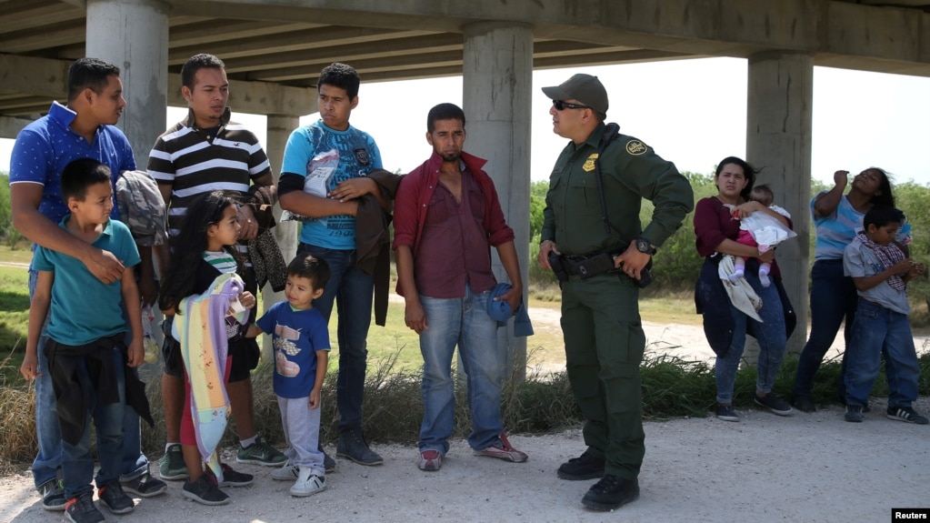 Image result for photos of families crossing US SOUTHERN border
