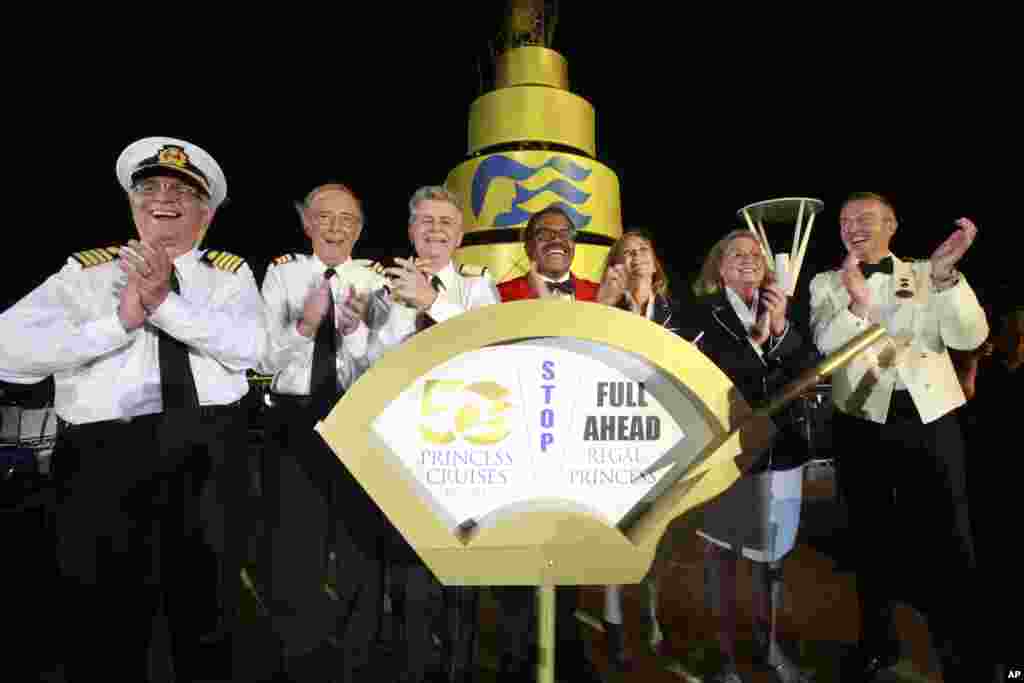 The original cast of The Love Boat (right to left: Captain Ed Perrin, Cynthia Lauren Tewes, Jill Whelan, Ted Lange, Fred Grandy, Bernie Kopell, and Gavin MacLeod) officially christened the Regal Princess at Port Everglades in Fort Lauderdale, Fla., Nov. 5.