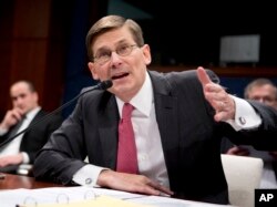 Former CIA Deputy Director Michael Morell testifies on Capitol Hill in Washington, April 2, 2014, before the House Intelligence Committee.