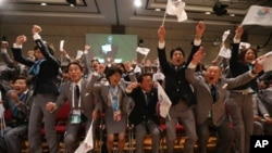 Tokyo 2020 delegation celebrates as city is awarded Summer Games during 125th IOC session, Buenos Aires, Sept. 7, 2013.