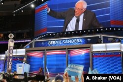 FILE - Former Democratic Presidential candidate Sen. Bernie Sanders takes the stage during the first day of the Democratic National Convention in Philadelphia, July 25, 2016.