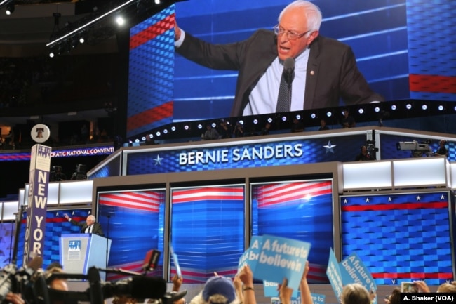 FILE - Former Democratic Presidential candidate Sen. Bernie Sanders takes the stage during the first day of the Democratic National Convention in Philadelphia, July 25, 2016.