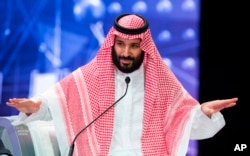 FILE - In this photo released by Saudi Press Agency, SPA, Saudi Crown Prince, Mohammed bin Salman addresses the Future Investment Initiative conference, in Riyadh, Saudi Arabia, Oct. 24, 2018.
