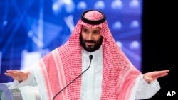 In this photo released by Saudi Press Agency, SPA, Saudi Crown Prince, Mohammed bin Salman addresses the Future Investment Initiative conference, in Riyadh, Saudi Arabia, Oct. 24, 2018.