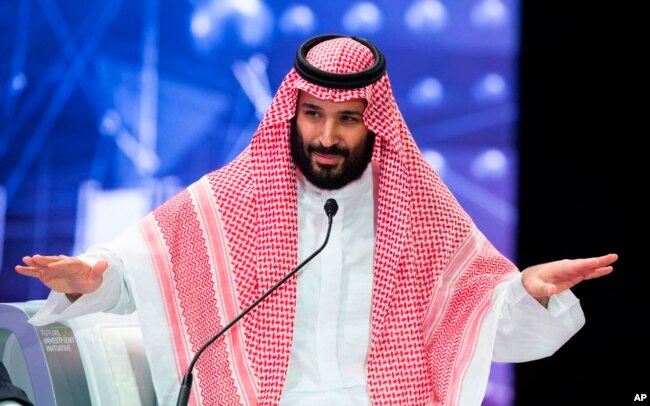 In this photo released by Saudi Press Agency, SPA, Saudi Crown Prince, Mohammed bin Salman addresses the Future Investment Initiative conference, in Riyadh, Saudi Arabia, Oct. 24, 2018.