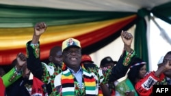 FILE - Zimbabwe's President Emmerson Mnangagwa addresses a rally in Bulawayo, June 23, 2018. Mnangagwa on Thursday addressed his first campaign rally after surviving an explosion at a rally late last month.
