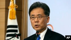 FILE - South Korean Trade Minister Kim Hyun-chong speaks during a press conference at the Foreign Ministry in Seoul, South Korea, Aug. 22, 2017.