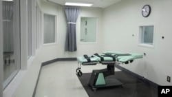 FILE - A 'death chamber' with lethal injection gurney is seen at San Quentin State Prison in San Quentin, California, Sept. 21, 2010.