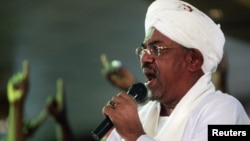Sudanese President Omar al-Bashir during a rally at the ruling National Congress Party headquarters, Khartoum, April 18, 2012.