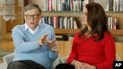 In this Feb. 1, 2018 file photo, Microsoft co-founder Bill Gates and his wife Melinda take part in an AP interview in Kirkland, Wash. (AP Photo/Ted S. Warren, file)