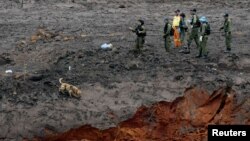 Israeli military personnel search for victims of a collapsed tailings dam owned by Brazilian mining company Vale SA, in Brumadinho, Brazil, Jan. 30, 2019. 