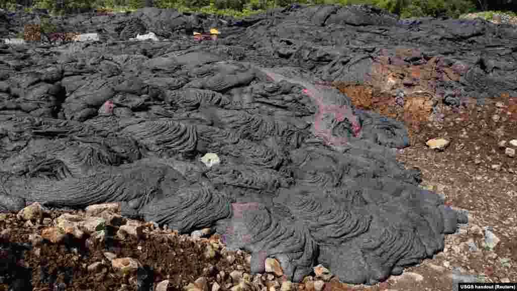 Sluggish lava toe breakouts are pictured along the south margin of the Kilauea volcano lava flow near Pahoa, Hawaii, Nov. 1, 2014.