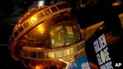 FILE: A Golden Globe statue appears at the nominations event for 79th annual Golden Globe Awards at the Beverly Hilton Hotel on Monday, Dec. 13, 2021, in Beverly Hills, Calif.
