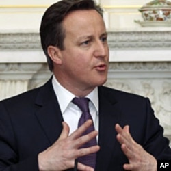 Britain's Prime Minister David Cameron (L) speaks during a joint news conference with Ireland's Taoiseach Enda Kenny in 10 Downing Street, London, March 12, 2012