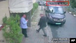 FILE - This image taken from CCTV video obtained by the Turkish newspaper Hurriyet and made available on Oct. 9, 2018 claims to show Saudi journalist Jamal Khashoggi entering the Saudi consulate in Istanbul, Oct. 2, 2018. 