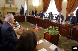 U.S. Secretary of State Rex Tillerson (L) meets Egyptian Foreign Minister Sameh Shoukry (R) and their delegations, in Cairo, Egypt, Feb. 12, 2018.