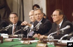 FILE - Sen. Orrin Hatch, R-Utah, questions professor Anita Hill, Oct. 11, 1991, in Washington during a Senate Judiciary Committee hearing on the nomination of Clarence Thomas to the Supreme Court. From left are: Chuck Grassley, R-Iowa, Alan Simpson, R-Wyo, Arlen Specter, R-Pa., Hatch, R-Utah, and Strom Thurmond, R-S.C.