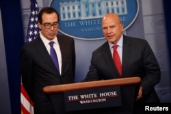 U.S. Treasury Secretary Steven Mnuchin, left, and National Security Advisor H.R. McMaster address sanctions on Venezuelan President Nicolas Maduro, during the daily press briefing at the White House in Washington, July 31, 2017.