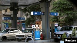 FILE: Cars are seen at a petrol station in downtown Cairo, Egypt. Taken Jun. 19, 2018. 