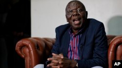 FILE: Zimbabwe opposition leader Morgan Tsvangirai speaks to the Associated Press after giving a press conference at his home in Harare, Zimbabwe Thursday, Nov. 16, 2017. 