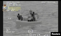 A rescue vessel is seen during the search and rescue operation underway after a boat carrying migrants capsized overnight, with up to 700 feared dead, in this still image taken from video released by Italian Guardia di Finanza, April 19, 2015.