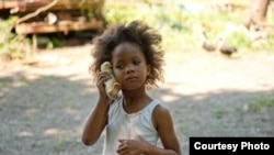 Quvenzhane Wallis as "Hushpuppy" on the set of Beasts of The Southern Wild (Photo: Fox Searchlight / Jess Pinkham)