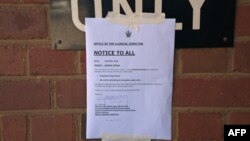 A notice on the nurses strike hangs outside Mpilo Central Hospital in Bulawayo, Zimbabwe, April 20, 2018. 