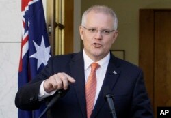 Australian Prime Minister Scott Morrison addresses media at Parliament House in Canberra, Australia, Feb. 13, 2019.