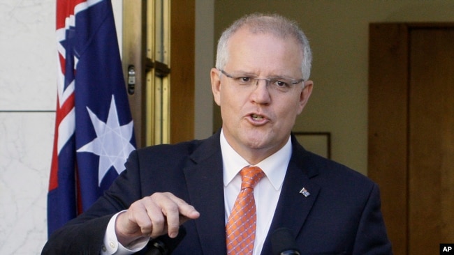 澳大利亞總理莫里森2019年2月13日在議會對媒體講話。