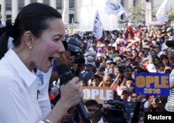 FILE - Philippine presidential candidate Grace Poe speaks at International Women's Day rally by Gabriela Party List women's group in Manila, March 8, 2016.