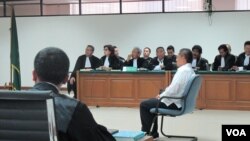 Anas Urbaningrum saat menjalani sidang perdana di Pengadilan Tindak Pidana Korupsi (Tipikor), di Jakarta Jumat (30/5).