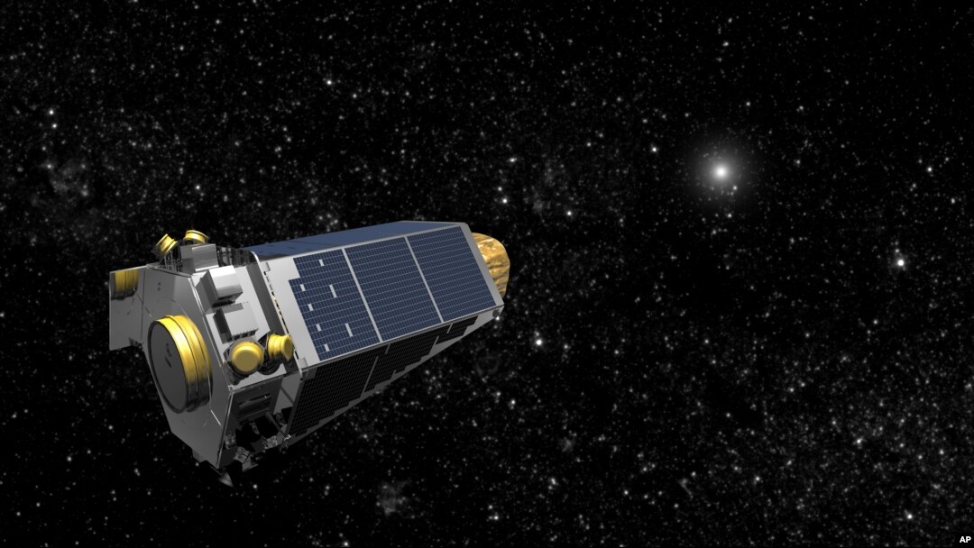 An artist's concept provided by NASA shows the Keplar Spacecraft moving through space.