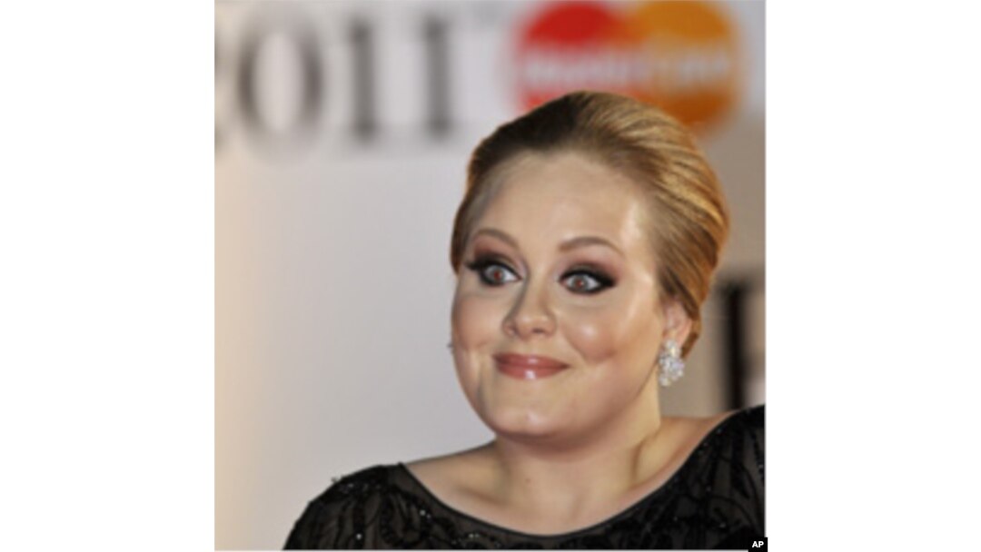 Singer Adele arrives at the Brit Awards in London