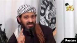 FILE - Deputy leader of al-Qaida in Yemen, Said al-Shihri, a Saudi national identified as Guantanamo prisoner number 372, speaks in a video posted on Islamist websites, unknown location, Jan. 24, 2009.