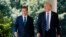 FILE - U.S. President Donald Trump walks with South Korean President Moon Jae-in to make statements in the Rose Garden at the White House in Washington, June 30, 2017. 