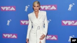 FILE - Kylie Jenner arrives at the MTV Video Music Awards at Radio City Music Hall in New York, Aug. 20, 2018.
