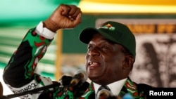 Zimbabwe's President Emmerson Mnangagwa speaks during the Extraordinary Congress of the ruling ZANU-PF party in Harare, Zimbabwe, Dec. 15,2017.