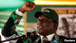 Zimbabwe's President Emmerson Mnangagwa speaks during the Extraordinary Congress of the ruling ZANU-PF party in Harare, Zimbabwe, Dec. 15,2017.