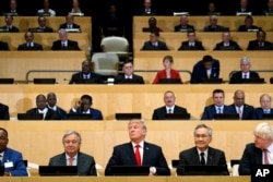 President Donald Trump participates in a photo before the beginning of the "Reforming the United Nations: Management, Security, and Development" meeting during the United Nations General Assembly at U.N. headquarters, Sept. 18, 2017.