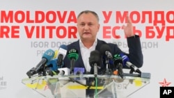 Moldovan presidential candidate Igor Dodon speaks to the media after voting ended in the presidential elections, in Chisinau, Moldova, Nov. 13, 2016. Dodon has been eager to scrap an EU association agreement in favor of a trade deal with Moscow.