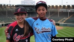 Emma March, from Canada, and Mo'ne Davis, from the U.S., are the two girls playing in the 2014 Little League World Series. (Photo from LLB, Inc.)